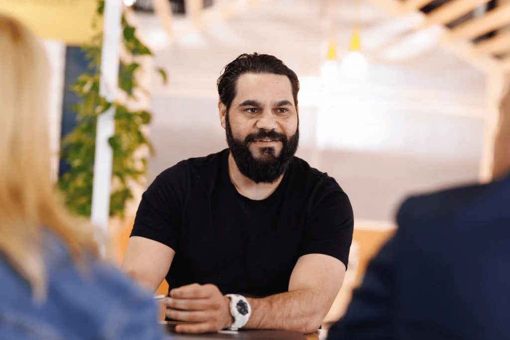 A middle-aged man in a meeting