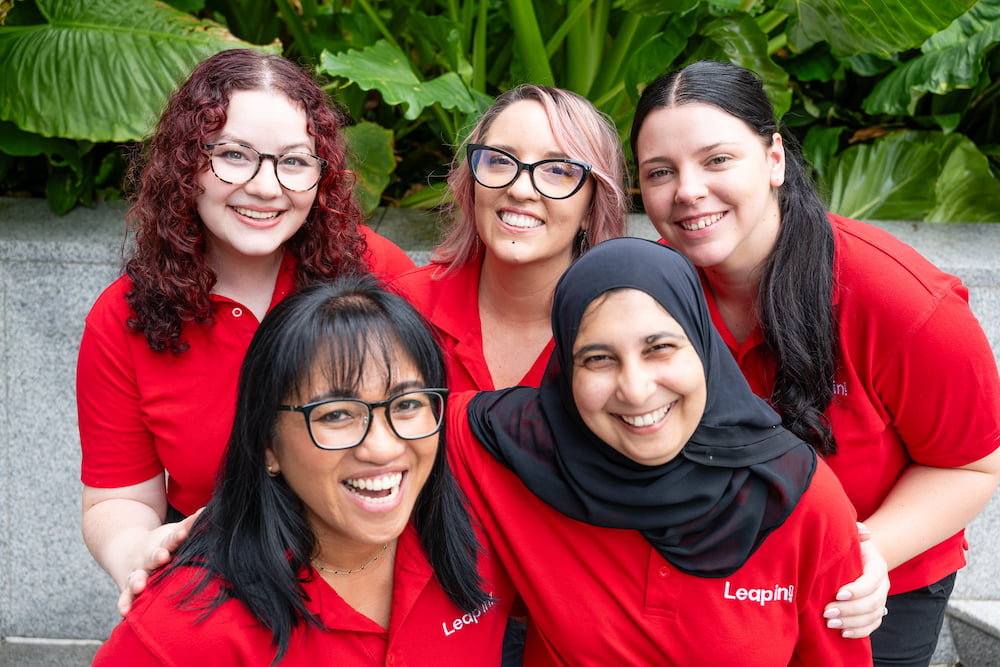 Members of the Leap in! crew smiling