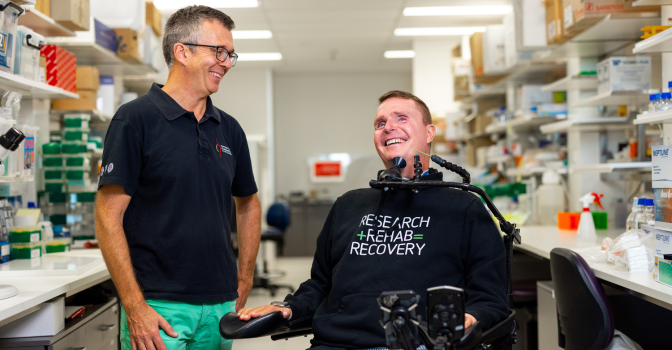 Leap in! member, Lindsay Nott and researcher in a lab.